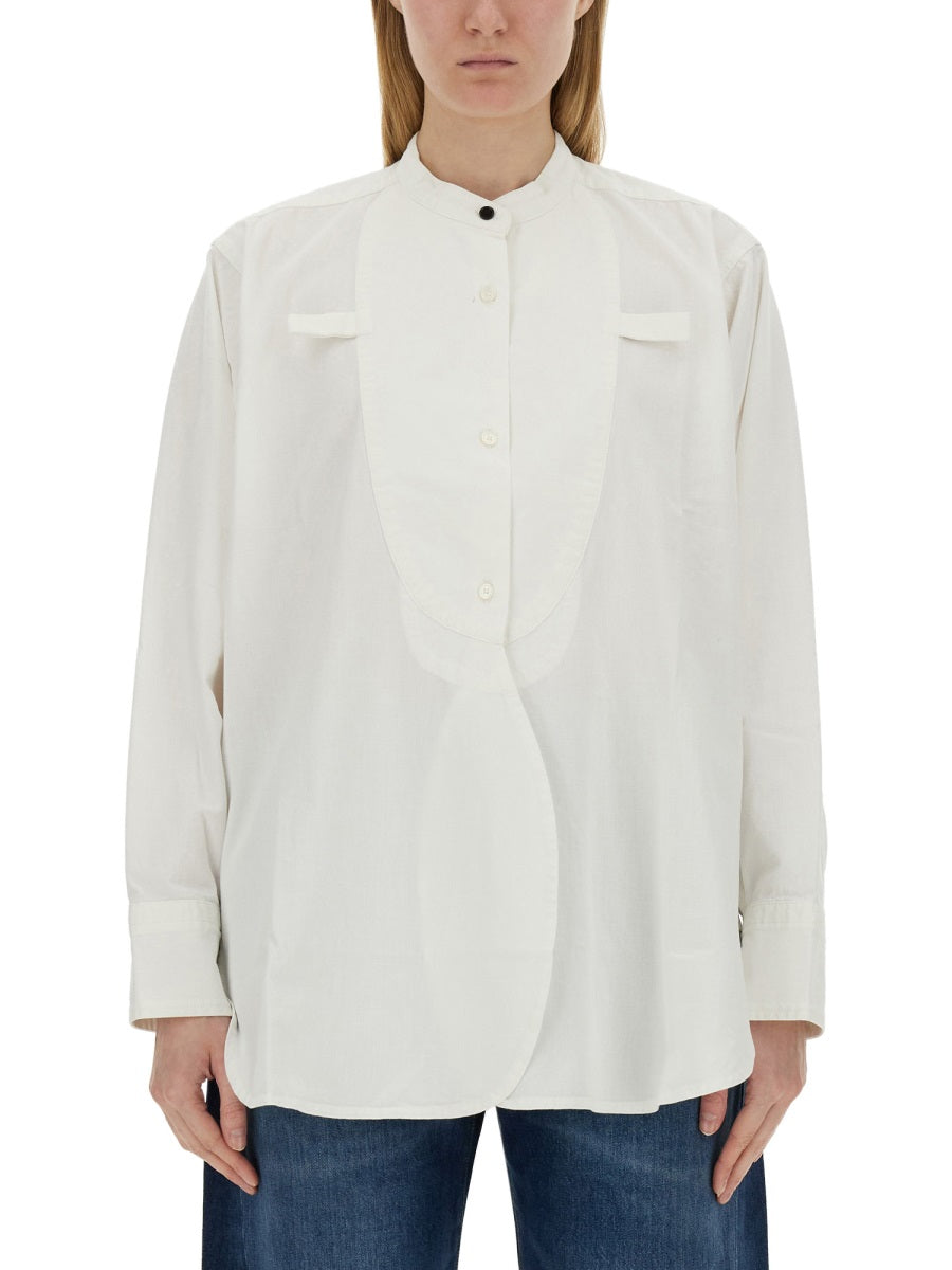 Woman wearing a Victoria Beckham washed white cotton shirt